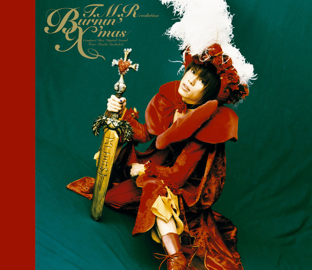 The album art for Burnin' X'mas by T.M.Revolution, where he wears an extravagant red costume made from fabrics resembling velour and crushed velvet. He wears a cape with a large collar and poses with a golden sword in his hand. His headpiece has a crown of red roses and a large feather-like white trim on top.